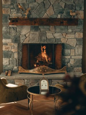 Stone fireplace with crackling fire